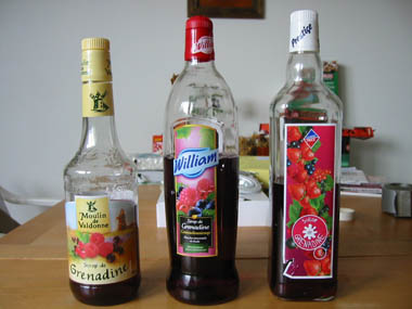 Three bottles of different Grenadine syrups